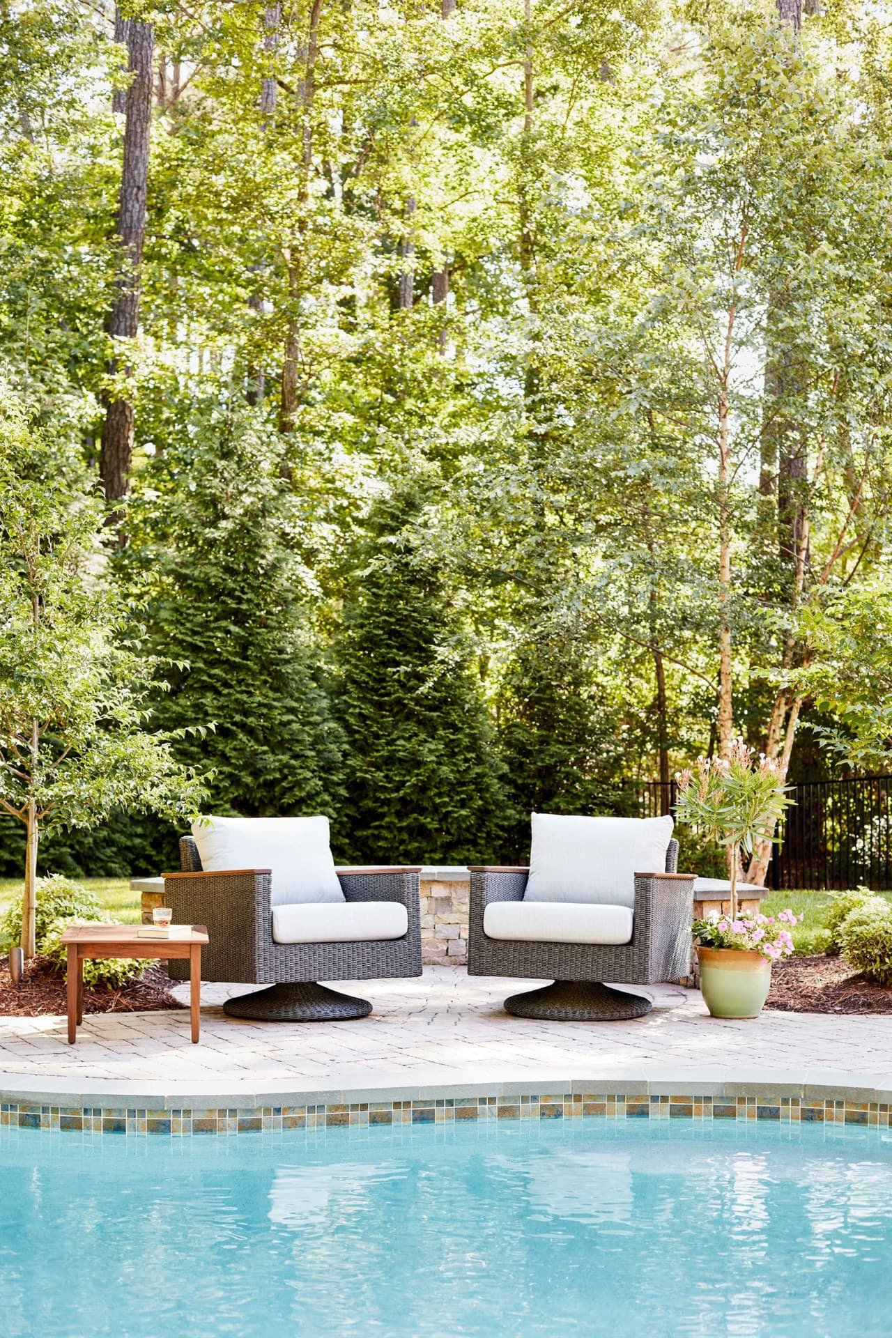 Jensen Outdoor Coral woven lounge chairs with light cushions